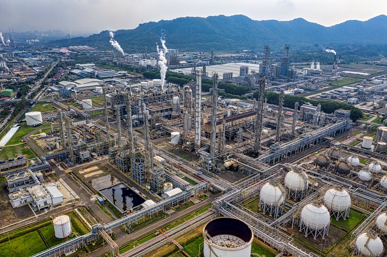The Art of Drawing Readers In: Your attractive post title goes here Aerial view of a large industrial oil refinery in Banten, Indonesia with storage tanks and pipelines.